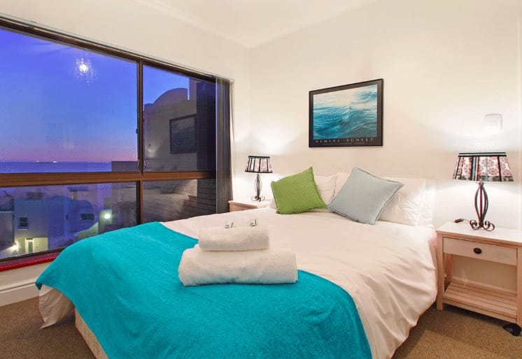 Photo 7 of Apartment 12 La Mer accommodation in Bloubergstrand, Cape Town with 4 bedrooms and 2 bathrooms