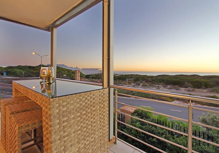 Photo 1 of Seaside Village A11 accommodation in Bloubergstrand, Cape Town with 3 bedrooms and 2 bathrooms