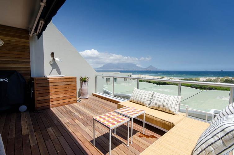 Photo 13 of Dolphin Beach Apartment accommodation in Bloubergstrand, Cape Town with 3 bedrooms and  bathrooms