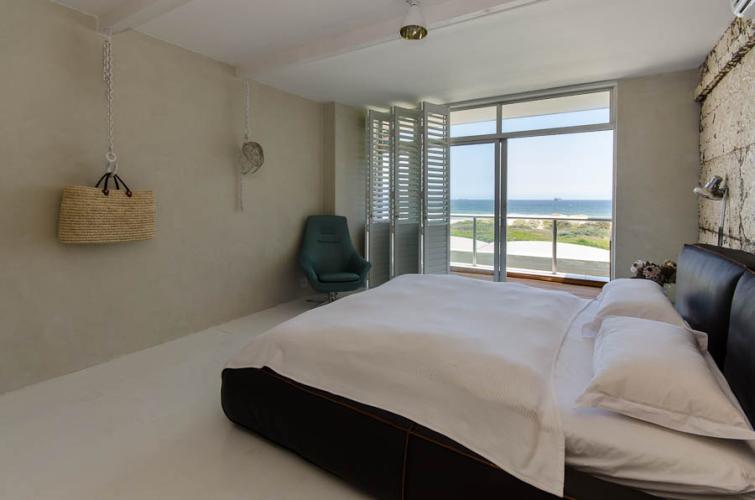 Photo 16 of Dolphin Beach Apartment accommodation in Bloubergstrand, Cape Town with 3 bedrooms and  bathrooms