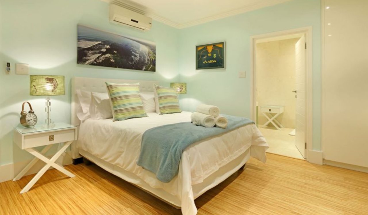 Photo 8 of Flamingo Villa accommodation in Melkbosstrand, Cape Town with 4 bedrooms and 3 bathrooms