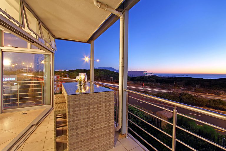 Photo 14 of Seaside Village A11 accommodation in Bloubergstrand, Cape Town with 3 bedrooms and 2 bathrooms